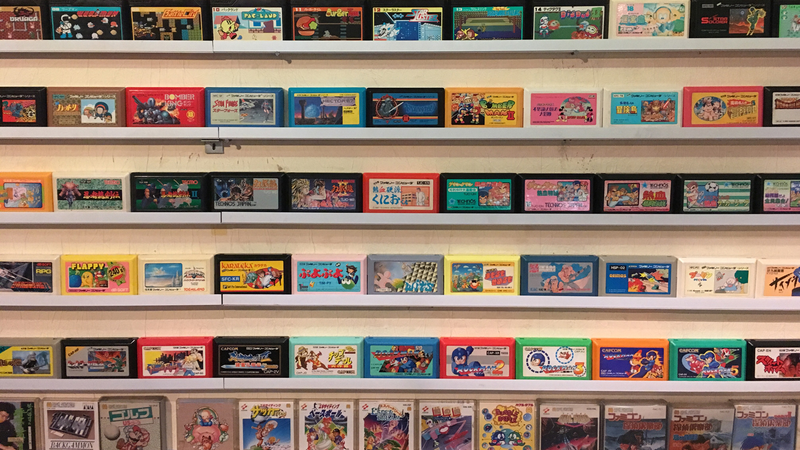 A wall of Famicom games on display at the video game bar Continue, in Osaka.